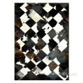 Cowhide black and white leather center area rug